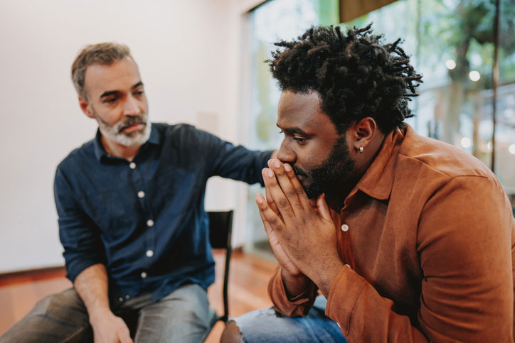 two men talking