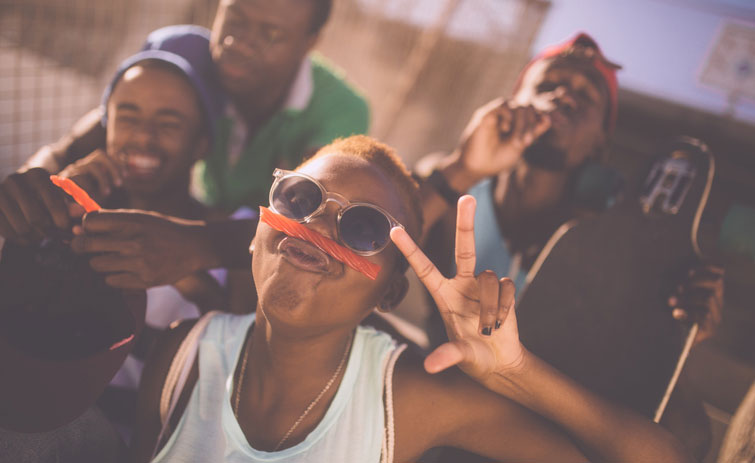 african american teens playing outside