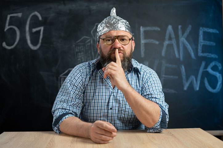 conspiracy theorist in foil hat