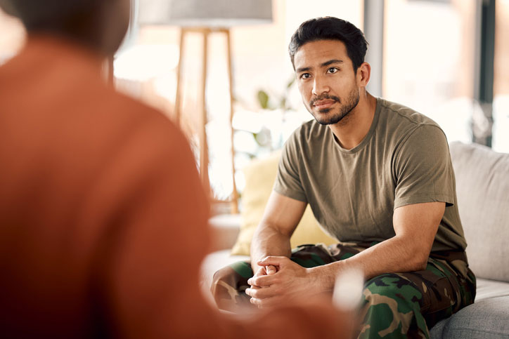 psychologist listening to soldier